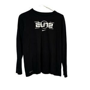 Boys black Nike long sleeve shirt size XL in Kid’s